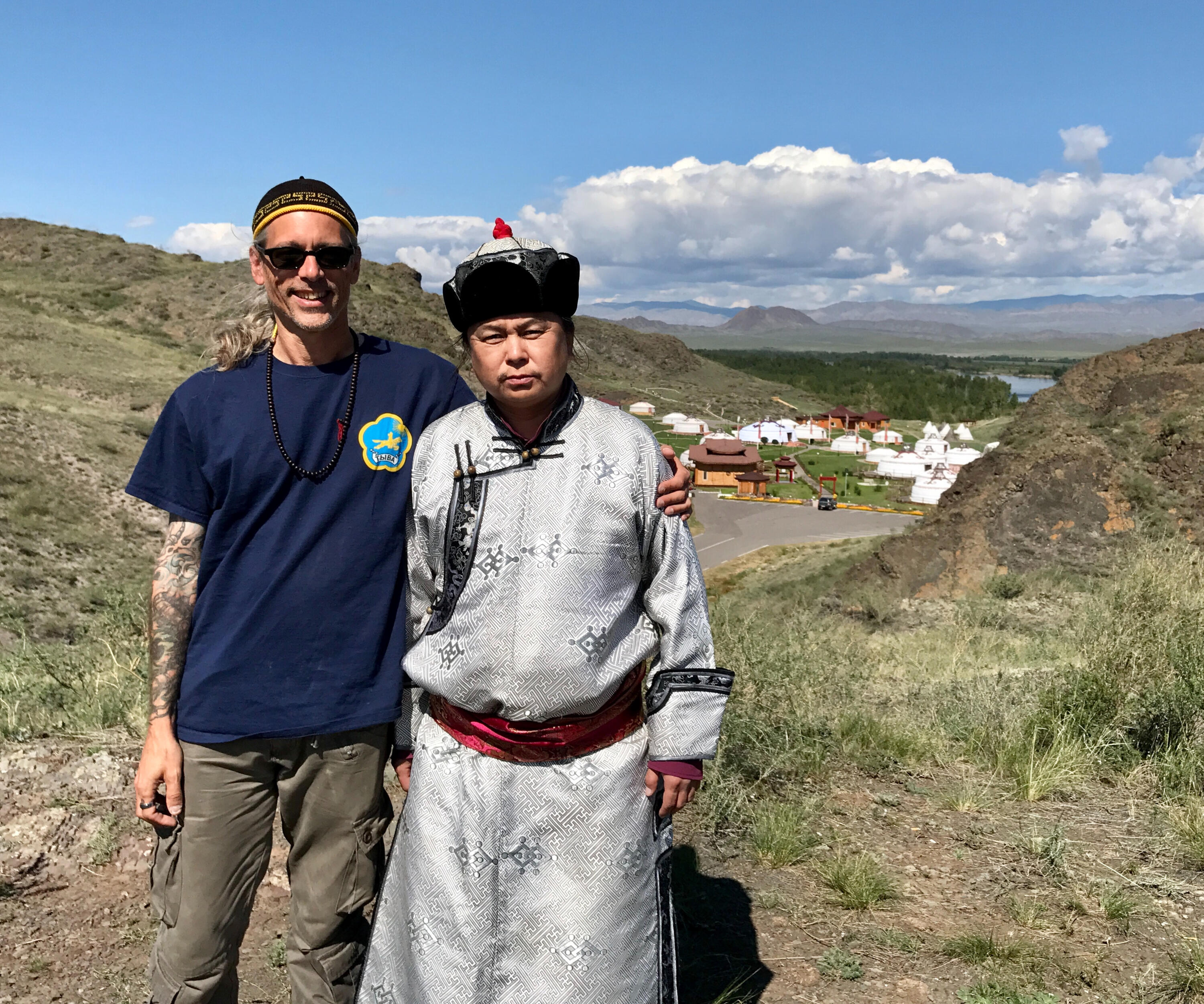 MICHAEL CLINE AND NACHYN CHODUU IN TUVA PHOTO OF THE AUTHOR AND A THROAT SINGER IN TUVA